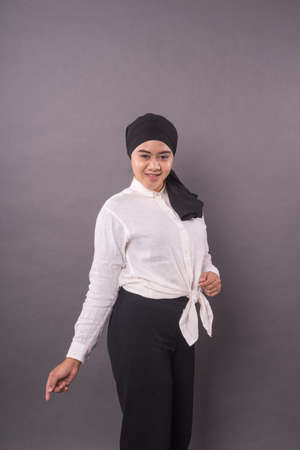 Portraiture of young asian girl wearing turban.Studio shot.の写真素材
