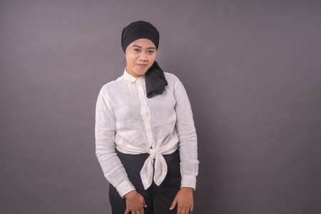 Portraiture of young asian girl wearing turban.Studio shot.