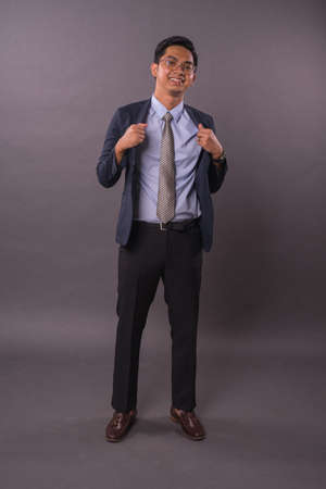 Portraiture of Young male intrepreneur or business man.Studio shot.の写真素材