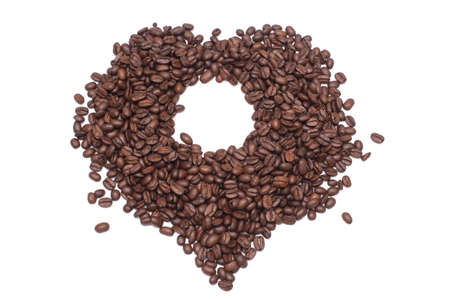 Roasted coffee beans isolated over white background.View From top with copy space.の写真素材