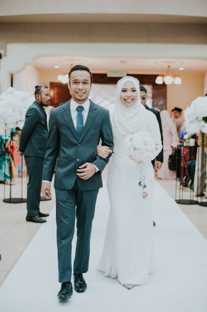 CIRCA 2017,Kuala Lumpur,Malaysia.Portraiture of a Muslim bride and groom during her wedding day.Malay Muslim Traditional wedding ceremony.のeditorial素材