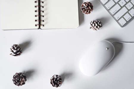 White office desk tabble with smartphone,headphone,computer keyboard and mouse.Top view with copy space.Flat lay.の写真素材