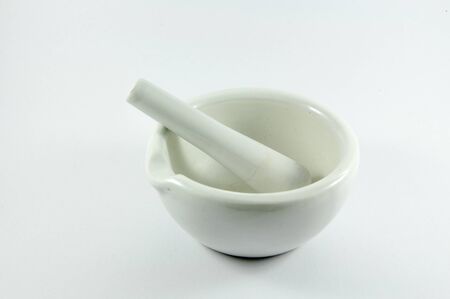 a cup-shaped receptacle made of hard material, in which ingredients are crushed or ground, used especially in cooking or pharmacy.の写真素材