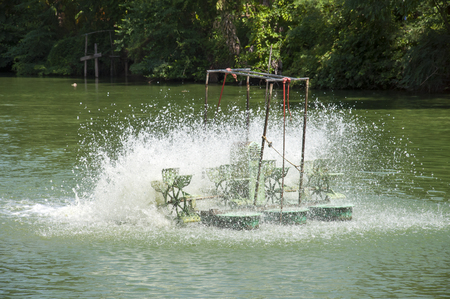 Water turbines in the pondの写真素材