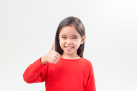 little girl child kid Asia cute isolated on white color backgroundの写真素材