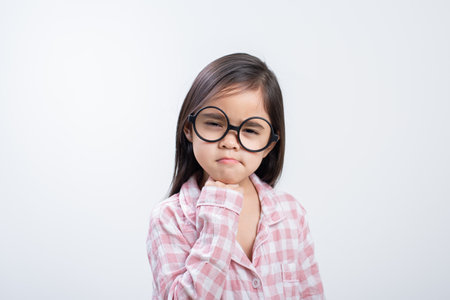little girl asian think white backgroundの写真素材