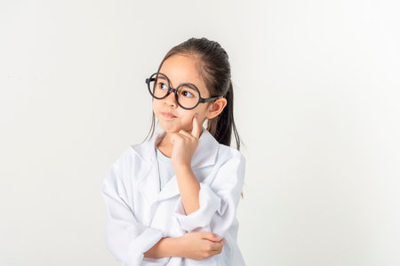 smart doctor Little Girl with white medical coatの写真素材
