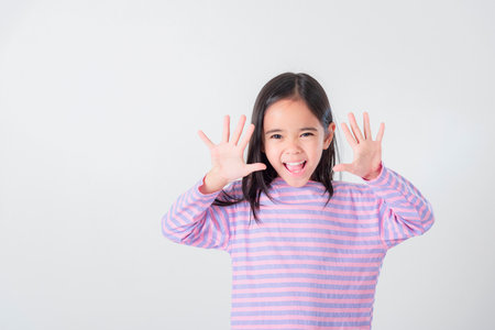 Image of Asian child posing on white  backgroundの写真素材