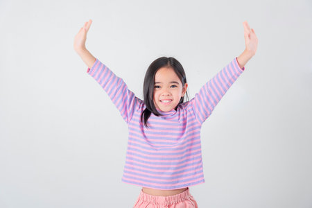 Image of Asian child posing on white  backgroundの写真素材