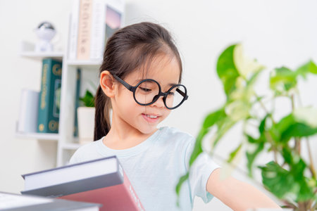 Asia A little Kid studying with video online lesson at home.の写真素材