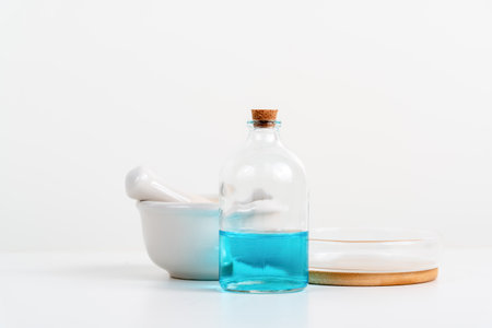 some test tube on the white table science lab with beakers, flasks, and test tubes filled with colorful liquids backgroundの写真素材