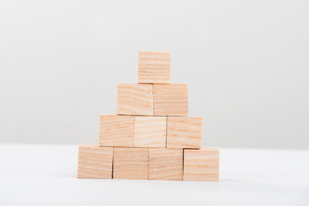 children's eco toys for toddlers, wooden cube isolated on a white background, the development of...