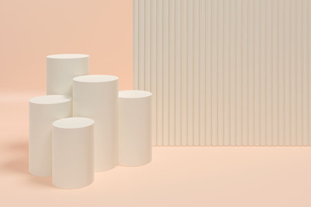 A white pillar is standing in front of a white wall. The pillar is in the middle of the wall and is surrounded by other pillars. The pillars are all white and are arranged in a rowの写真素材