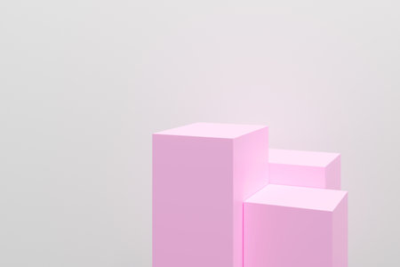 A pink cube structure is shown against a white background. The pink cubes are arranged in a triangular formation, creating a sense of balance and harmonyの写真素材