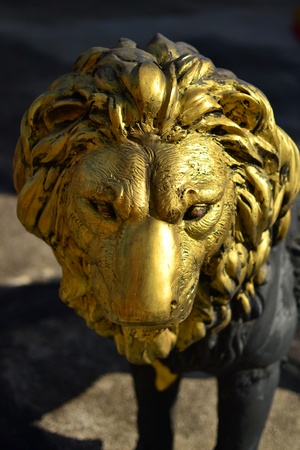 Golden lion statues in Thai temple,Thailand.の写真素材