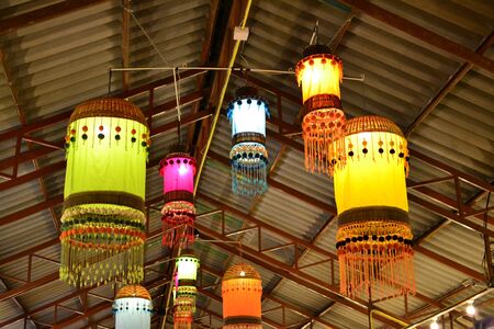 Colorful lamp hanging at night.の写真素材