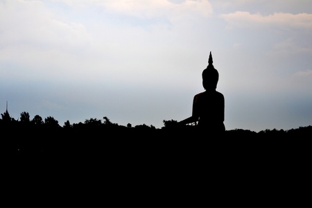 Silhouette of Statue of sitting buddha at Thai temple,Angthong Province,Thailand,Asiaの写真素材