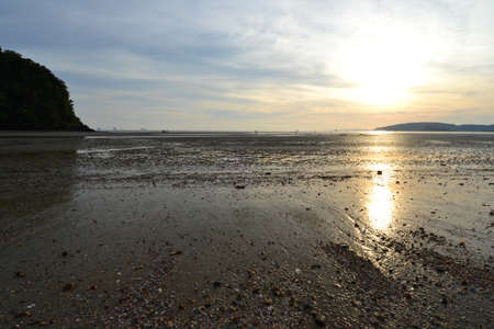 Sunset by the sea,Nopparat Beach,Krabi Province, Southern of Thailand.の写真素材