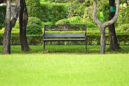 Wooden  bench in the public park Rat-cha-mang-khala,Thailandのeditorial素材