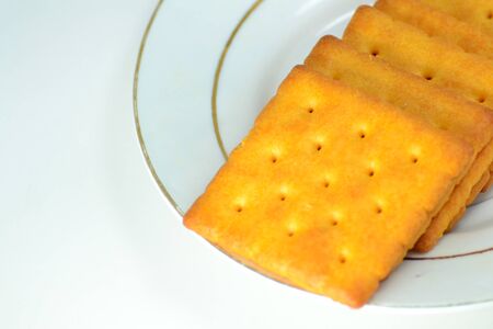 Close up crackers isolated on white background.の写真素材