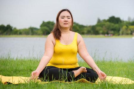 Fat woman was meditatingの写真素材