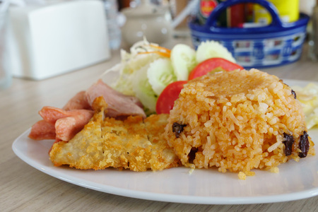 American fried rice , Fried rice with Chicken , sausage , ham and egg. Delicious food in Thailandの写真素材