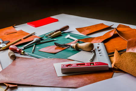 Leather craft maker in workhopの写真素材
