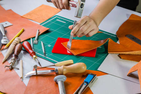 Leather craft maker in workhop