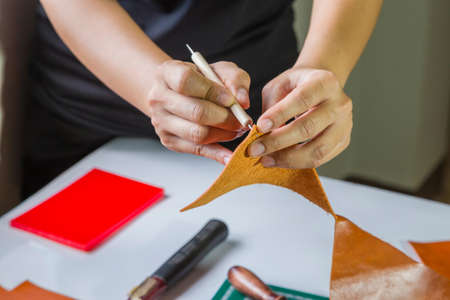 Leather craft maker in workhop