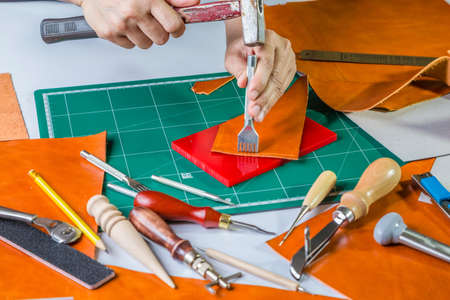 Leather craft maker in workhop