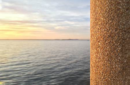 Beautiful pebble stones pillar with ocean view