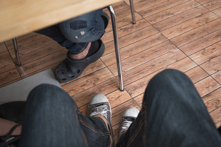 Legs of people sitting and waiting conceptの写真素材