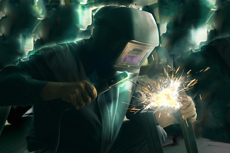 Welder welding and creation. Futuristic concept. Technology developmentの写真素材