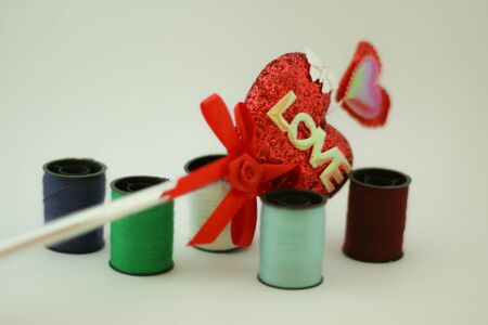 Colorful  yarn with love stickの写真素材