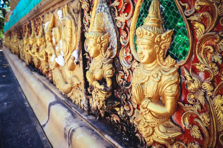 beautiful base statue under the buddhaの写真素材