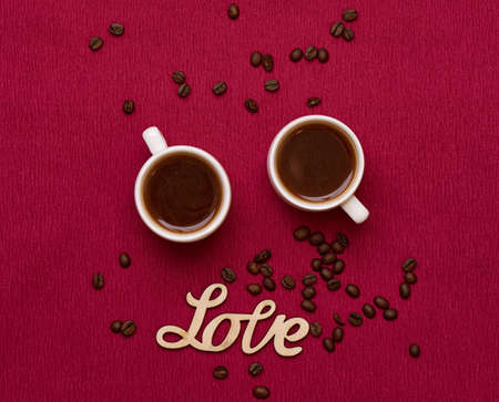 Two Cups of Coffee and Coffee Beansの写真素材