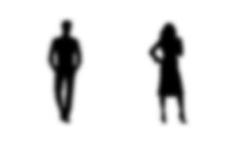 Vector blurred silhouettes of a man and a woman, a couple of standing business people, black color isolated on a white backgroundのイラスト素材