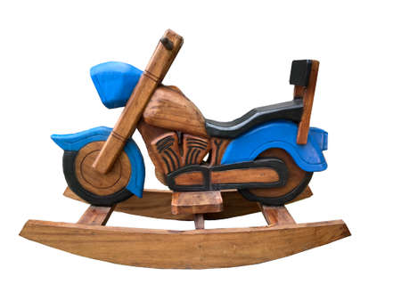 Rocking horse, wooden motorcycle, white backgroundの写真素材