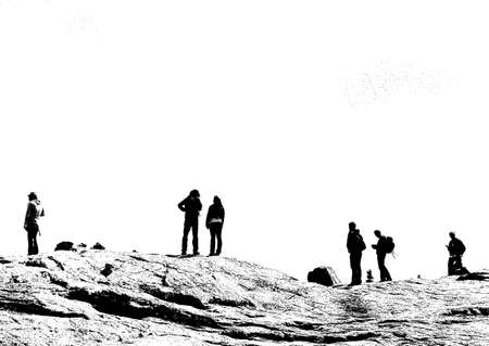 Group gazing out from a Mountain Top