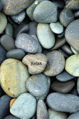 Zen stack of pebbles on the beachの写真素材