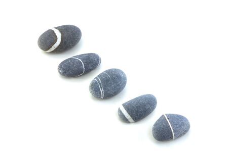 smooth stone on white backgroundの写真素材