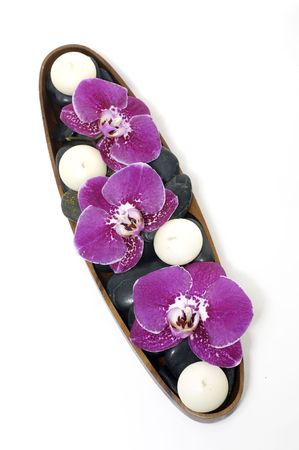 Bowl of beauty orchid with candle, stonesの写真素材