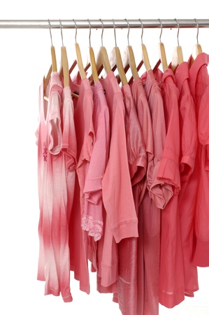 Fashion clothing hanging on hangersの写真素材