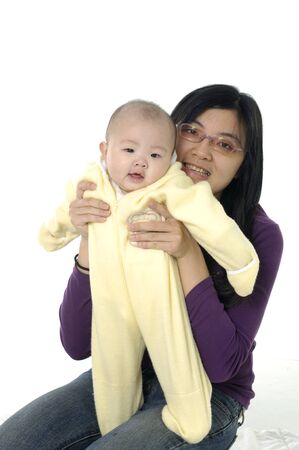 happy mother with baby over whiteの写真素材