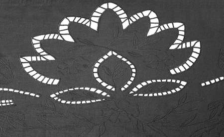 Openwork embroidery (Richelieu) from black fabric close upの写真素材