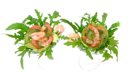 Shrimp in a glass with avocado and arugula closeの写真素材