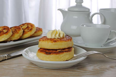 cheese pancakes for breakfast with a cup of coffee
