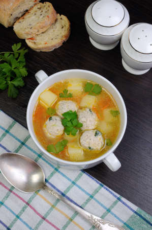 Easy chicken soup with meatballs and potatoesの写真素材