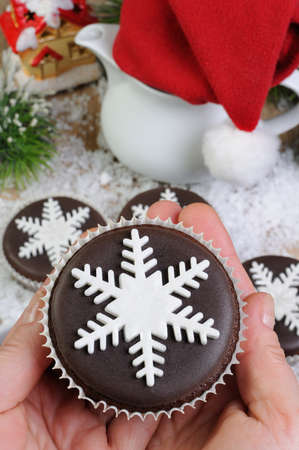 Chocolate Christmas Muffins decorated with marzipan pearl snowflakeの写真素材