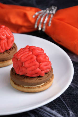 bloody brains out on the marzipan cookie sandwich on Halloweenの写真素材